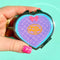 model holding purple polly pocket themed 'pilly pocket' pill case