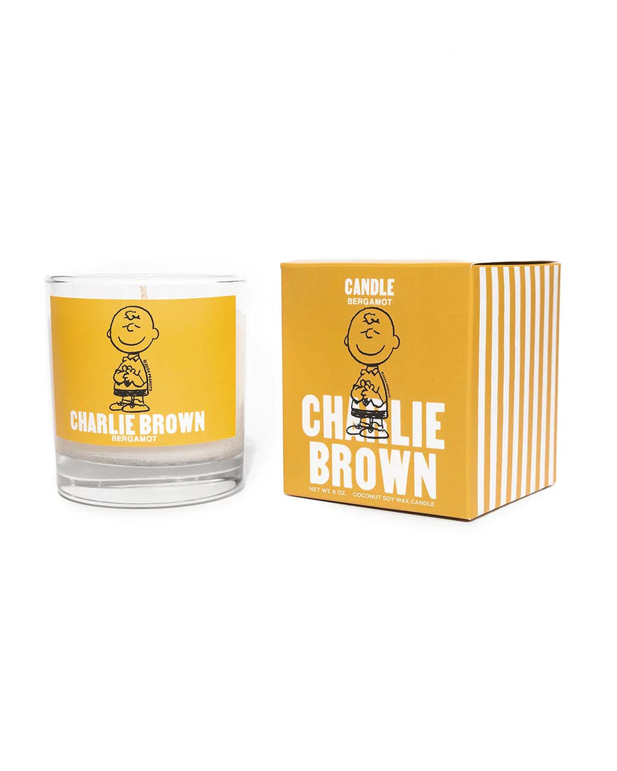 bergamot scented candle with charlie brown graphic and box