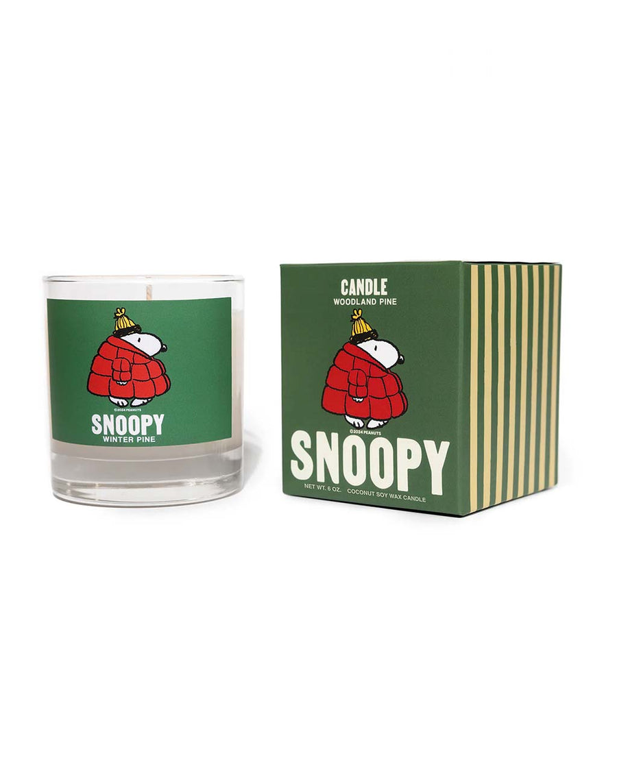 pine scented candle with puffy snoopy graphic and box