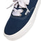up close of dark navy authentic sneaker with white sole and laces