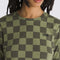 up close of model wearing two tone green checkered crop t-shirt