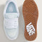 top and bottom view of light blue and white puffy vans sneakers with white and tan soles