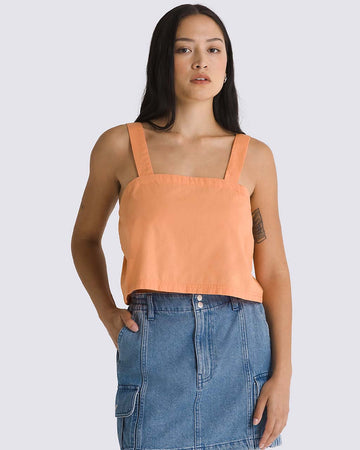 model wearing peach cropped tank with square neckline