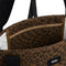 interior of brown and black trippy checker midi tote bag with black straps and vans logo on the front
