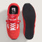 top and bottom of red vans super low pro trainer sneakers with white accents with red laces