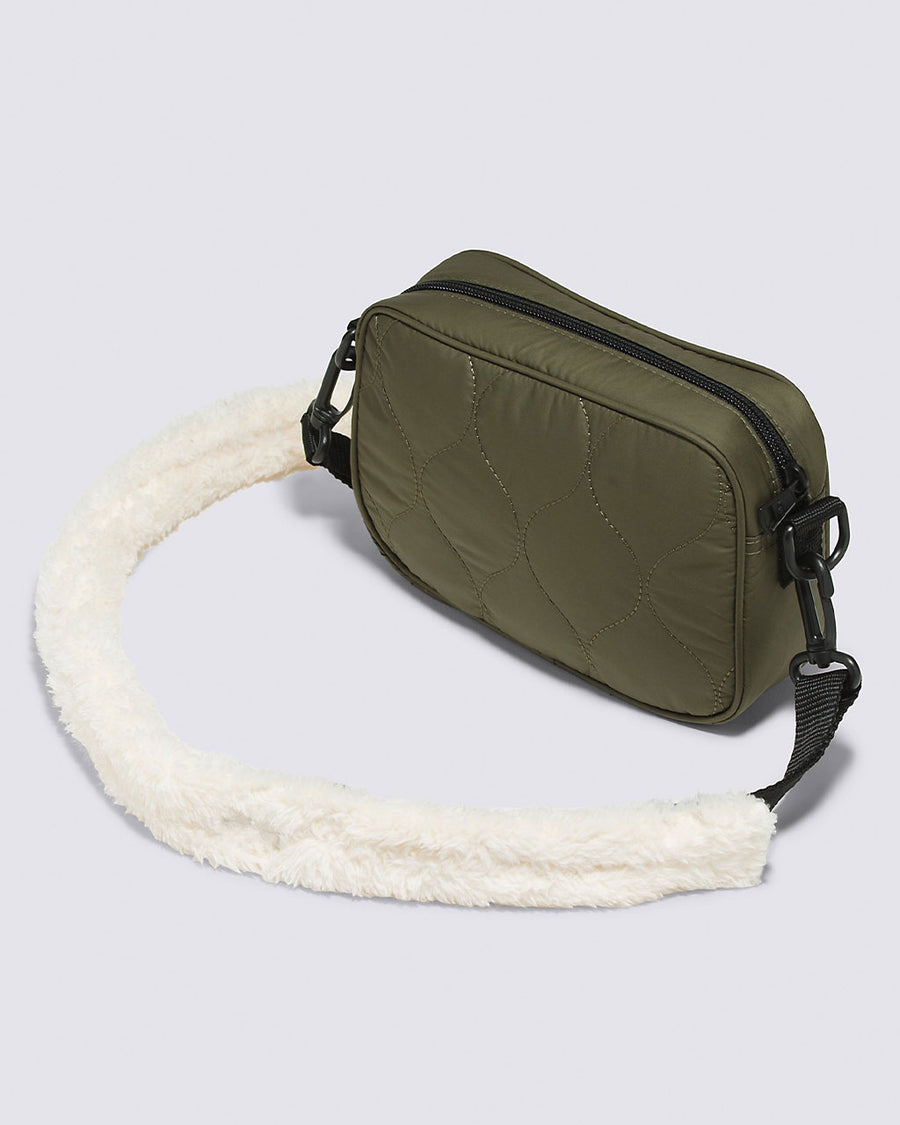 back view of green quilted crossbody with removable sherpa strap