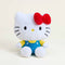 hello kitty wearing blue overalls and yellow top with her iconic red bow warmie plush