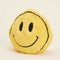side view of yellow smiley face heating plush