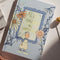 hardcover alice through the looking glass book on a table