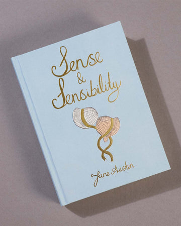 hardcover sense & sensibility book on a table