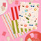 flattened wrapping paper set with 16 double sided tags; 8 with stripes + 8 with all over icons
