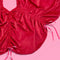 red velvet cinched tree skirt with red satin bows