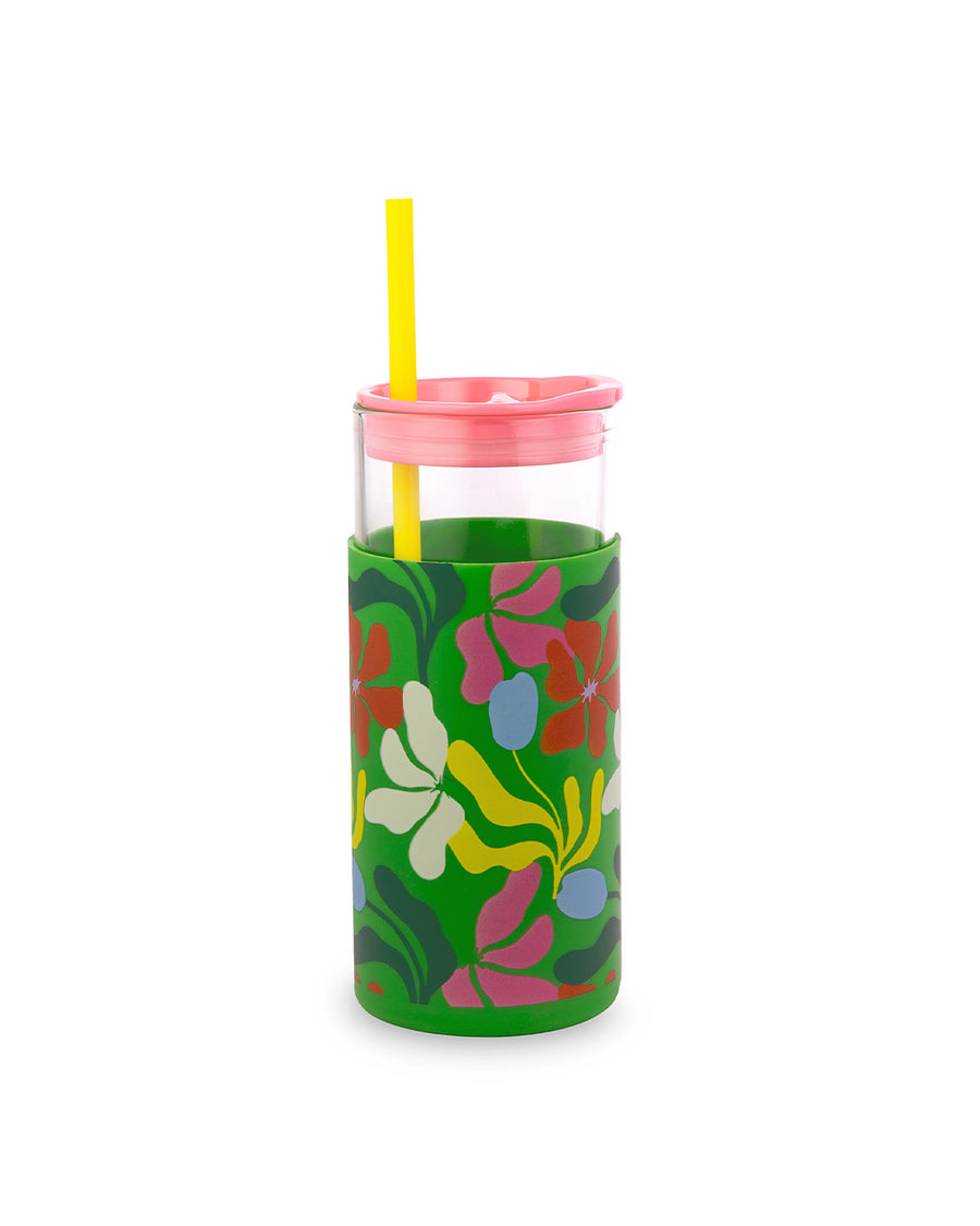 glass 20 oz tumbler with pink lid, yellow straw and sleeve with a green abstract floral print