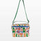 white quilted lunch bag with all over charcuterie print with green and blue trim