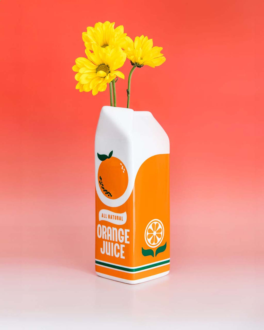 Porcelain orange juice carton-shaped vase