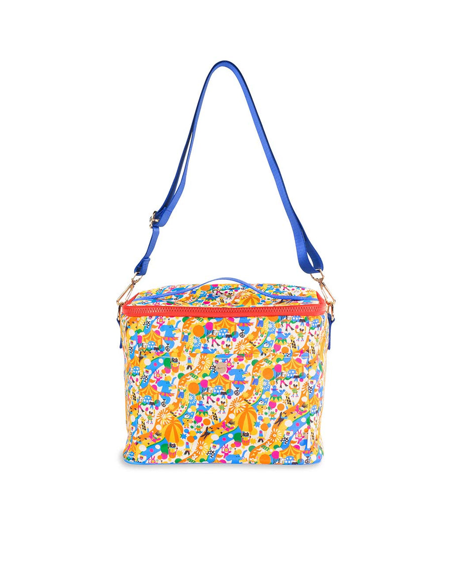 front view of cooler bag with vibrant fairgrounds print and royal blue adjustable strap