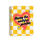 yellow checkered mini notebook with air spray painted 'having the most fun possible' across the front