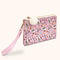 side view of pink hello kitty pencil pouch with removable strap and all over hello kitty character and food print