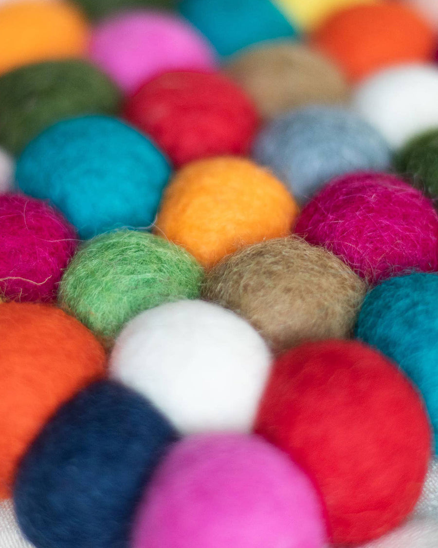 up close of colorful poms