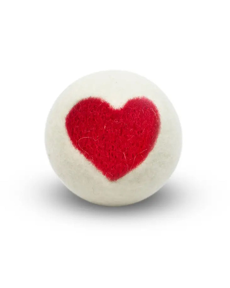white wool laundry ball with large red heart in the middle