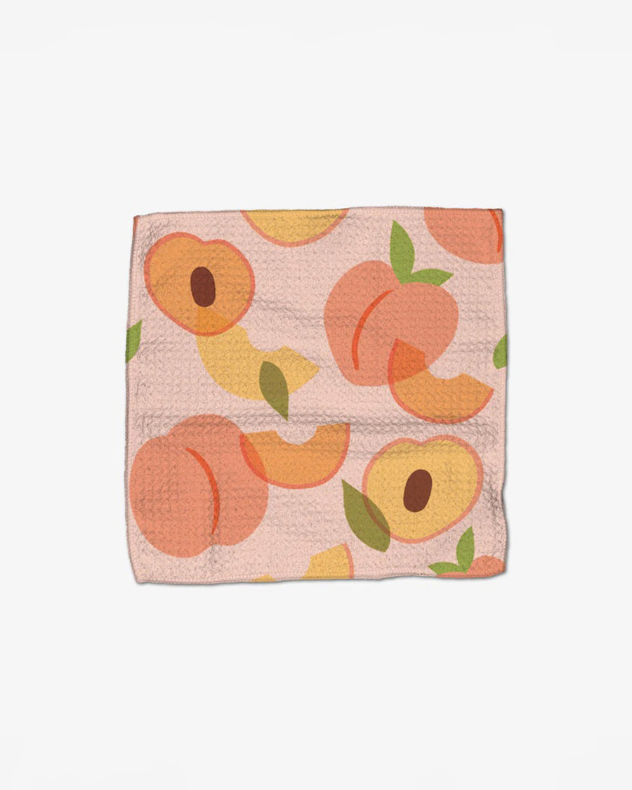 light pink dishcloth with peach print