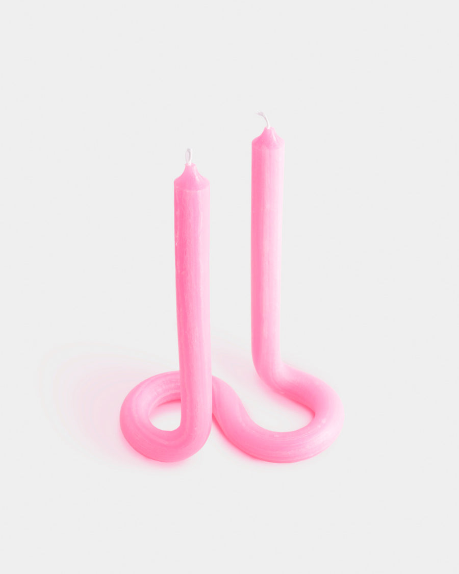 light pink twisted candle with 2 wicks