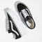 pair of black and white stackform van sneakers with large white sole