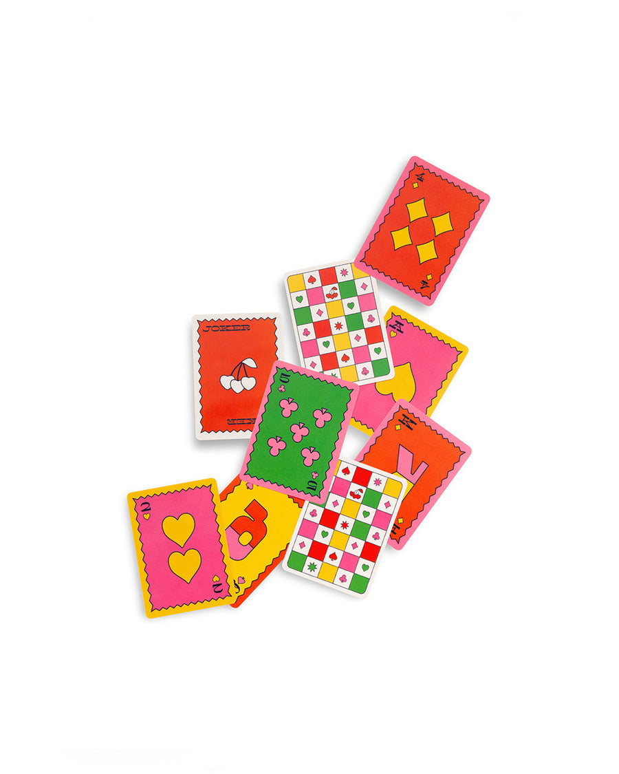 scattered image of playing cards to show faces
