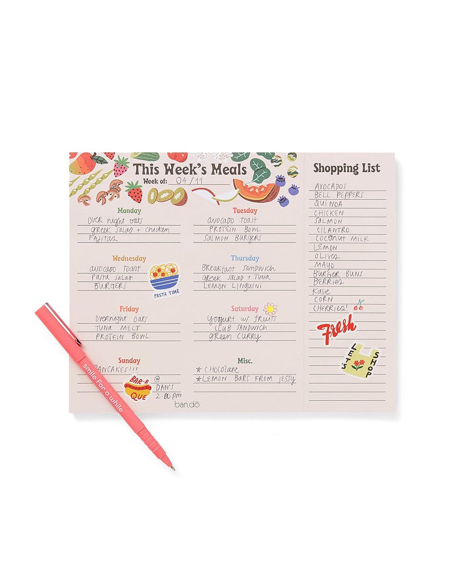meal planner with spaces for each day of the week and a side section for a shopping list