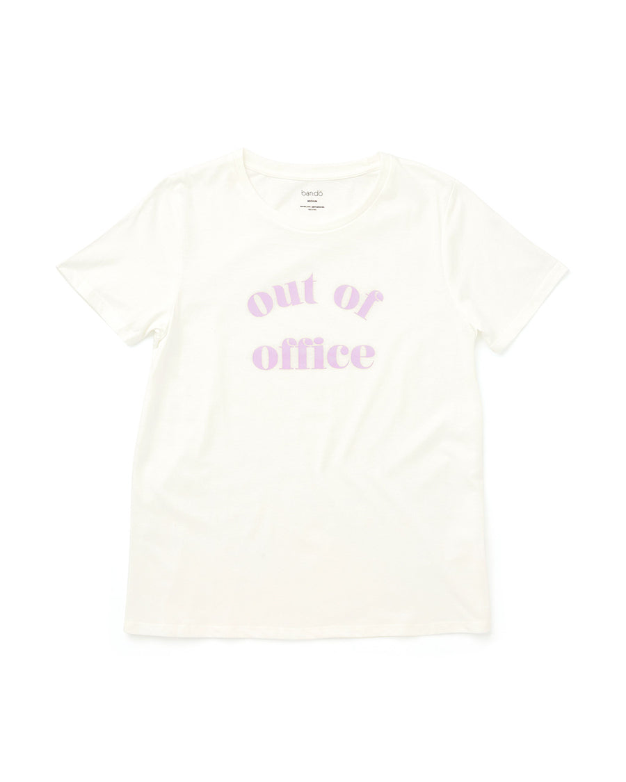 cream short sleeve tee with lilac 'out of office' across the front 