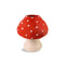mushroom shaped ceramic vase with natural colored stem and red and white polka dot top