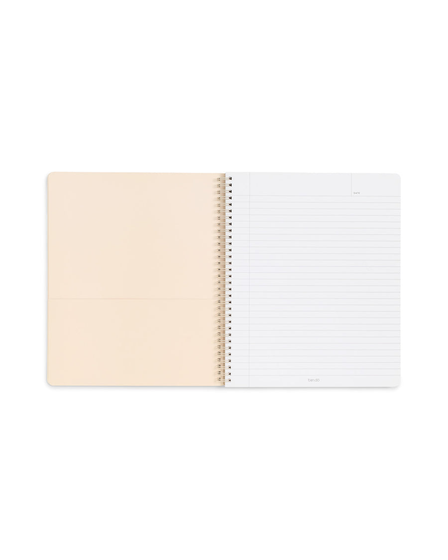 open view of spiral notebook with ivory inner page with pocket, and lined white paper