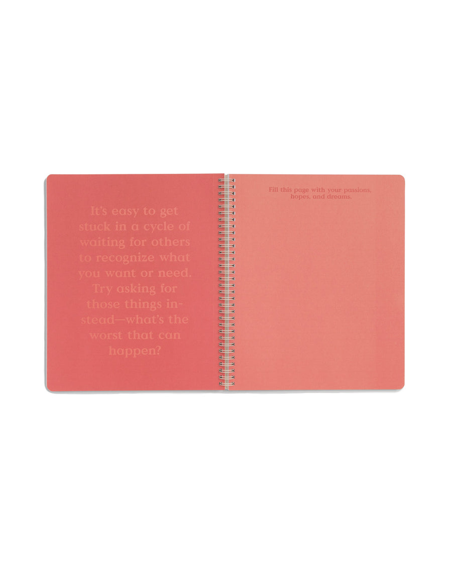 Centerfold of notebook with inspirational words and a space to write.