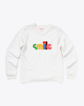 white sweatshirt with multicolor 'SMILE'