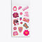 interior page of sticker book showing pink stickers