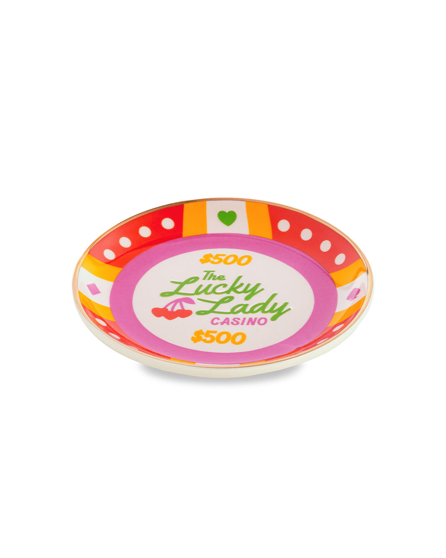 poker chip trinket tray with colorful print with 'the lucky lady casino $500' across the front laying flat