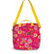 back view of lunch bag with yellow detachable strap, and hot pink garden print