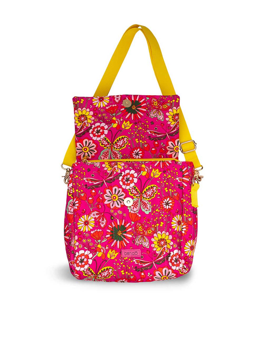 open front lunch bag with yellow detachable strap, and hot pink garden print