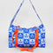 white and blue Scandinavian floral print with red strap and bow