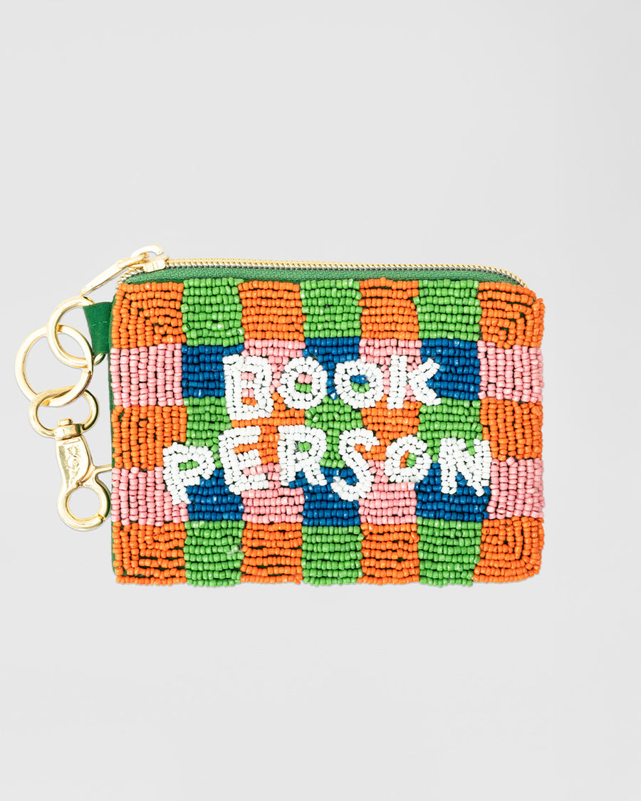 colorful checkered beaded coin pouch with white beaded 'book person' and removable gold hardware