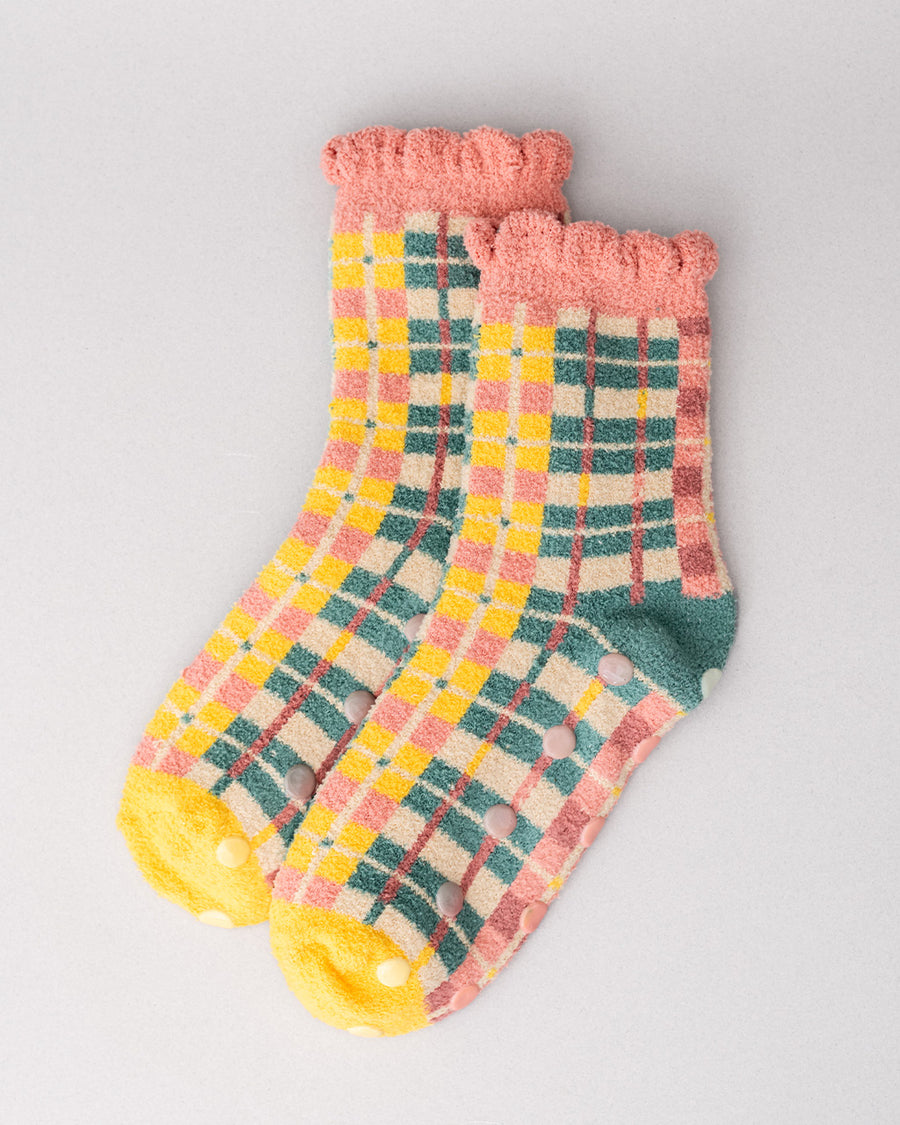 coral, teal, cream and yellow plaid chenille socks with coral ruffle top and cream grip bottoms