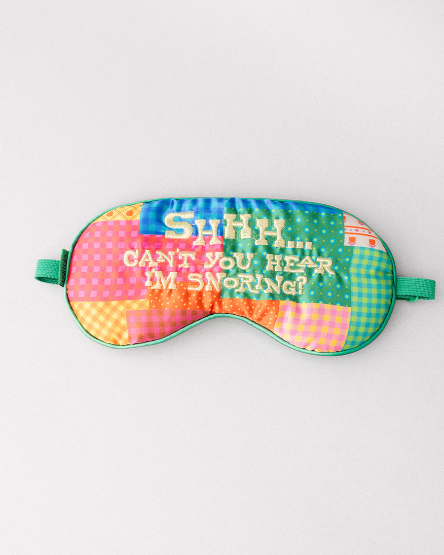 colorful patchwork eye mask with cream 'shhhh...can't you hear i'm snoring?' across the front