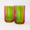 side view of set of two high ball glass set with four colors sections: pink, green, orange and red
