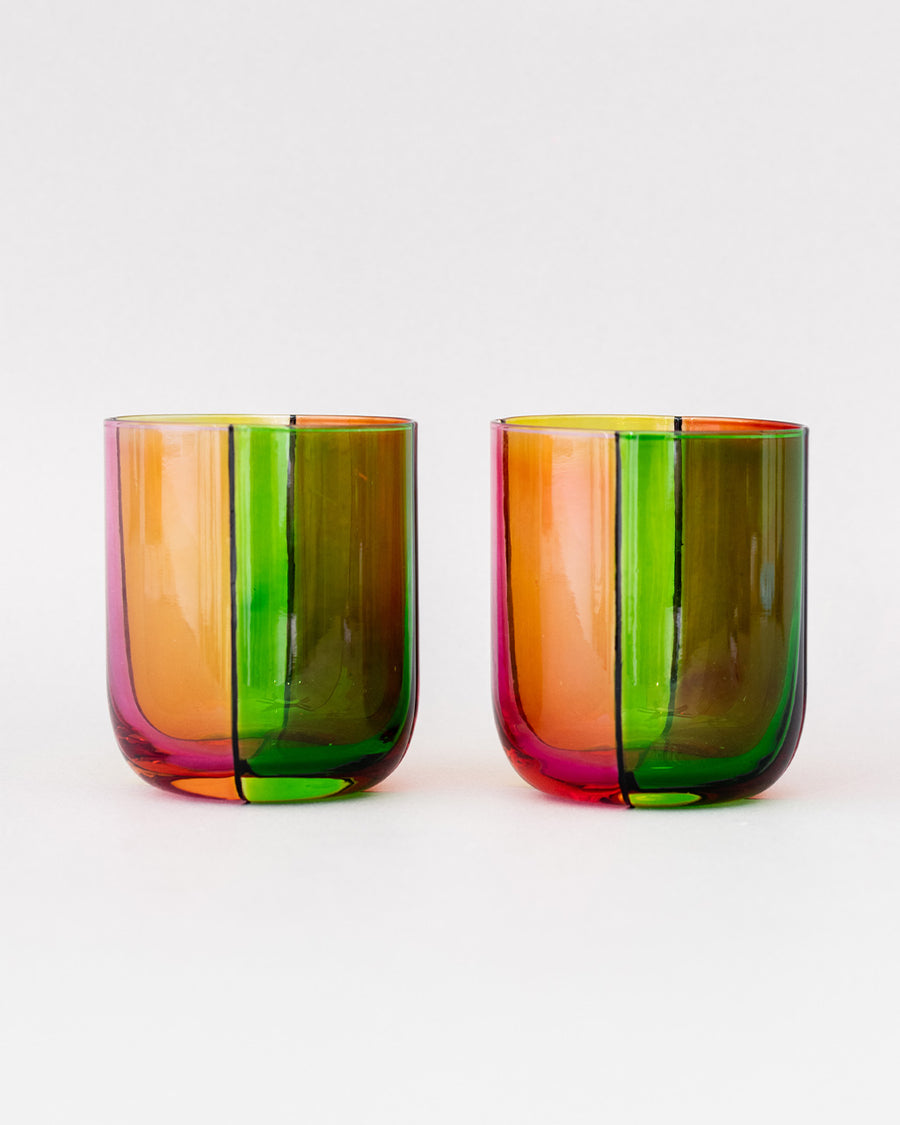 front view of set of two low ball glass set with four colors sections: pink, green, orange and red