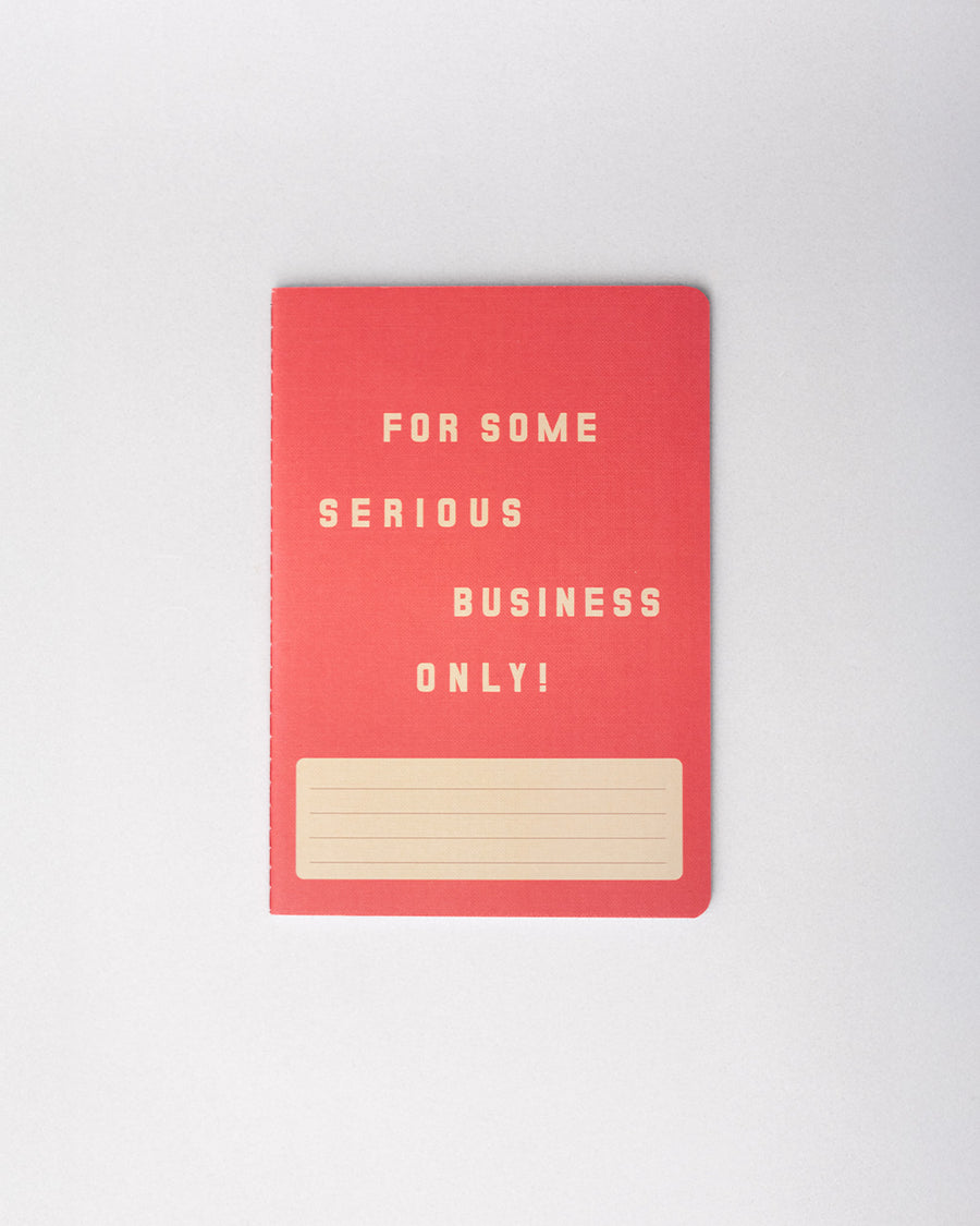 red notebook that says 'FOR SOME SERIOUS BUSINESS ONLY!' in cream