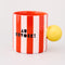 AU REVOIR side of red and white vertical stripe mug with yellow ball handle and double sided typography with 'BONJOUR!' on one side and 'AU REVOIR' on the other