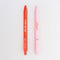 set of two: one pink and one red fidget pen with C'EST LA VIE on the red one and bonjour on the pink