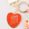 up close of red heart keychain that says 'good things' ahead