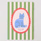 green and white vertical stripe notebook with cat in a red frame