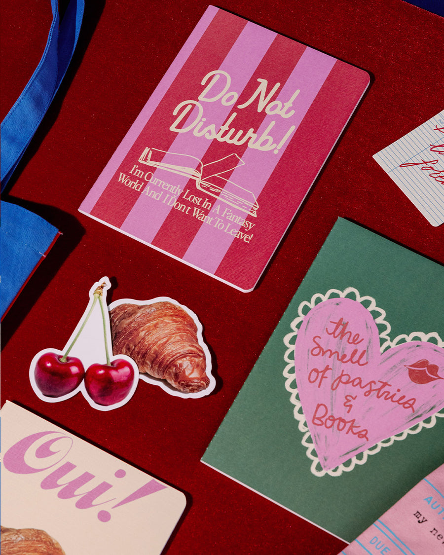 Set of three colorful pocket notebooks